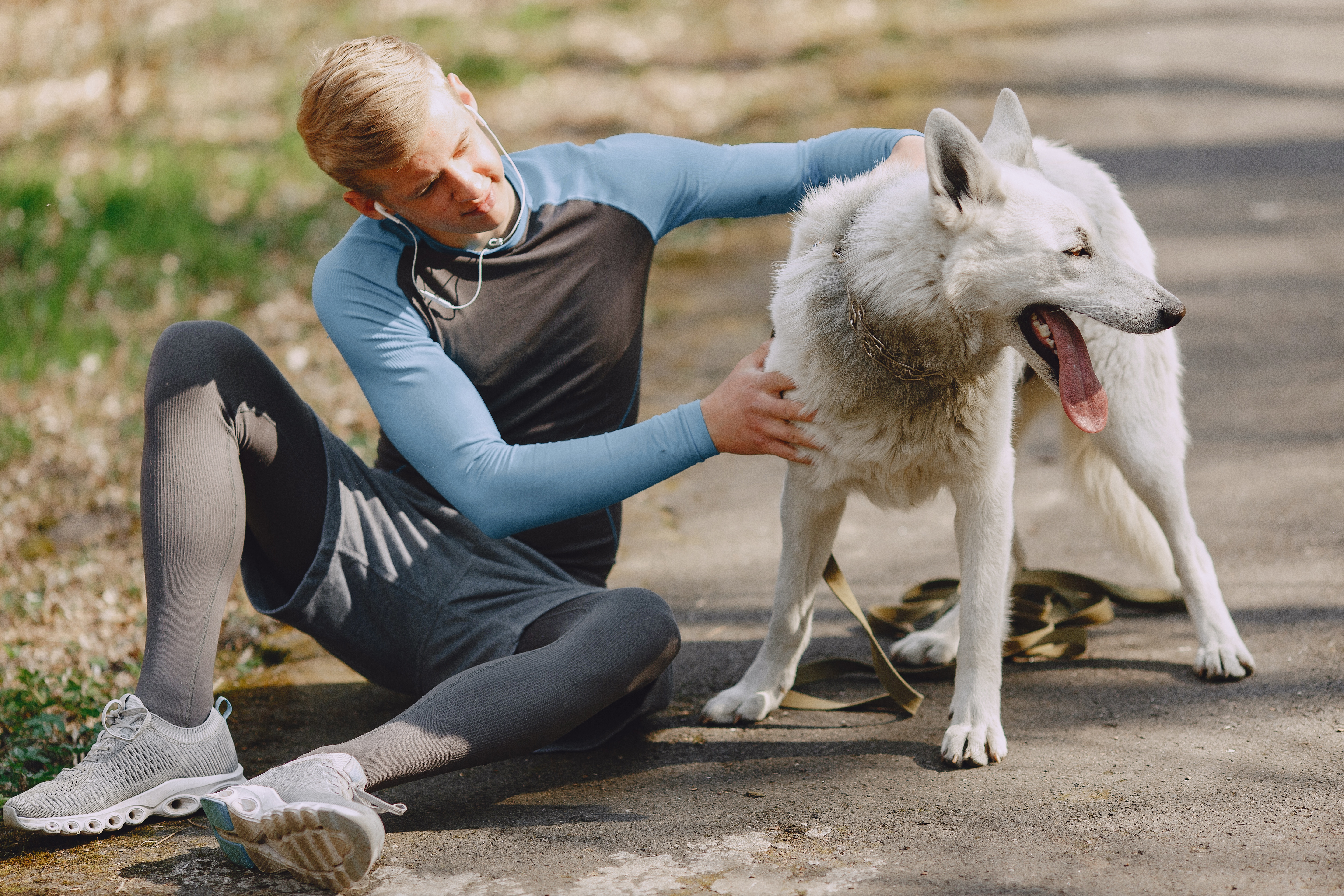 Handsome man training in a summer forest