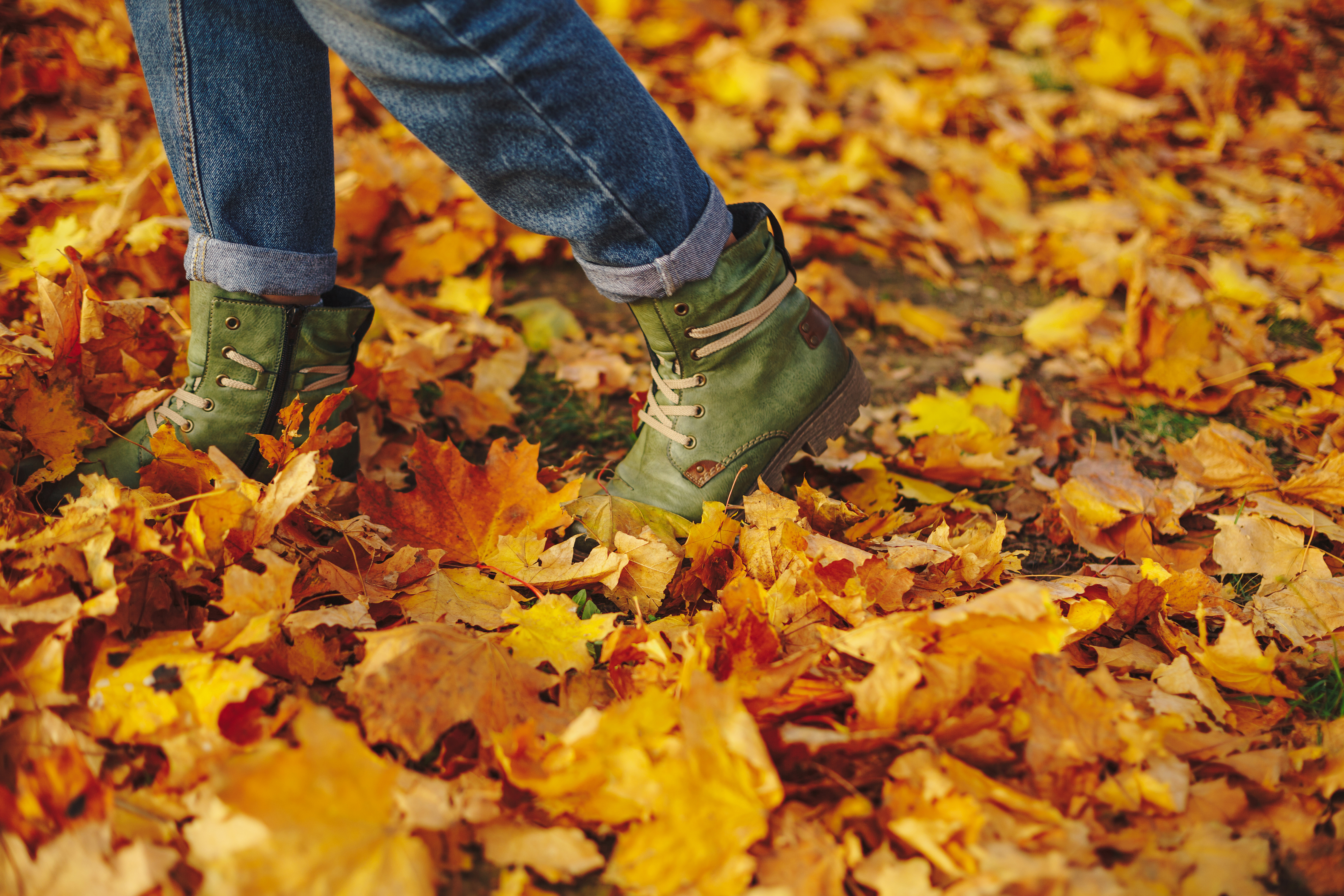 Leather shoes walking on fall leaves Outdoor